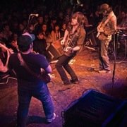 Spook the Horse band members performing live