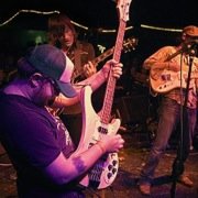 Spook the Horse band members performing live