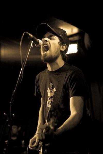 With Friends Like These band member, Brian Pake, performing live.